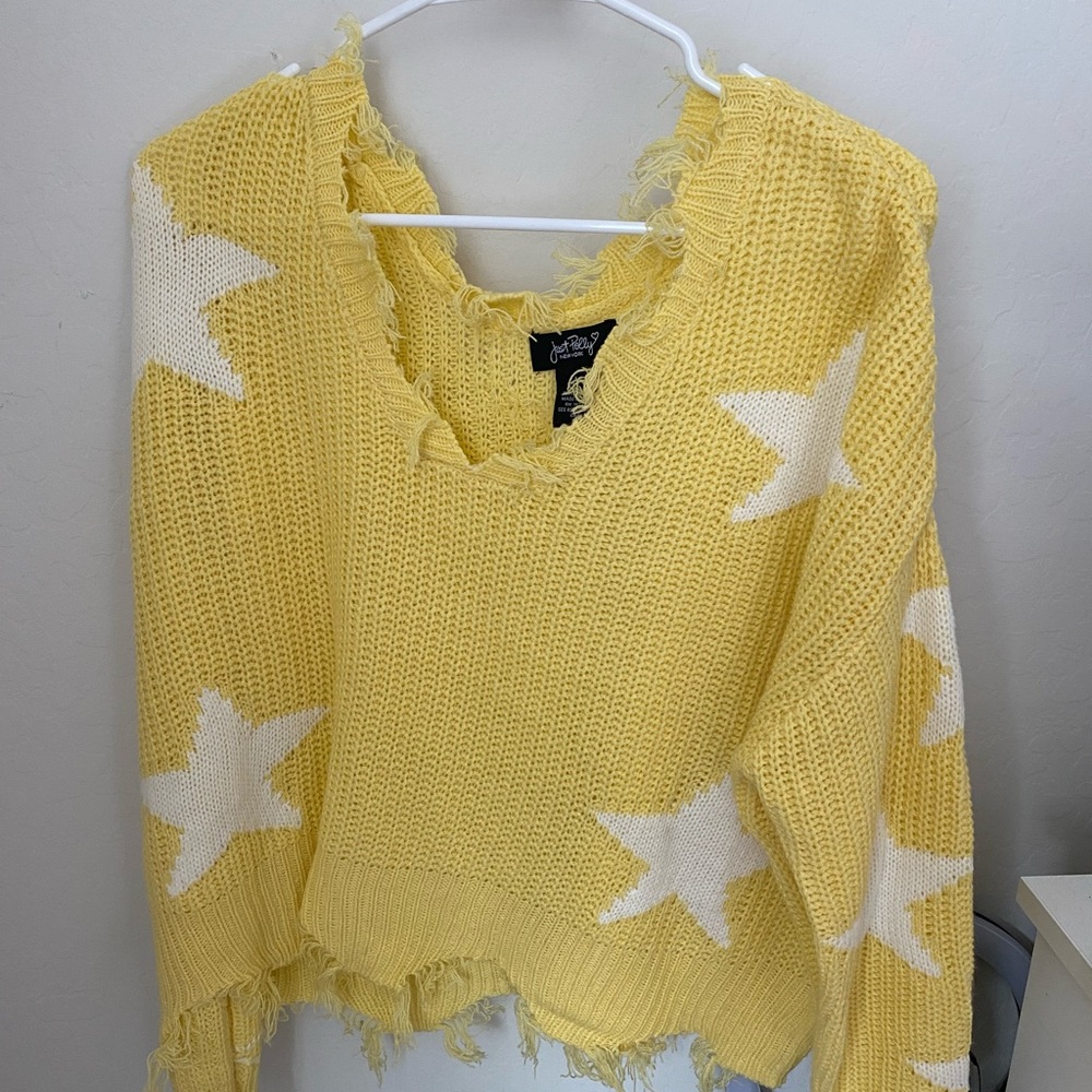 Star distressed sweater